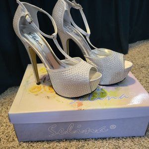 Size 8 silver platform heel with rhinestone detail